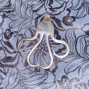 Abstract heart shaped authentic silver fork pendant.